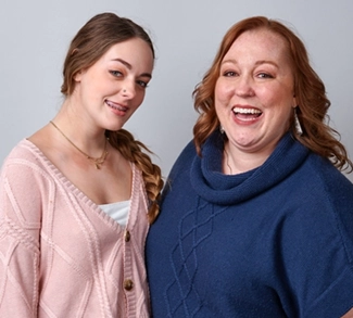 A real patient and caregiver smiling, sharing their story managing eczema with Opzelura.