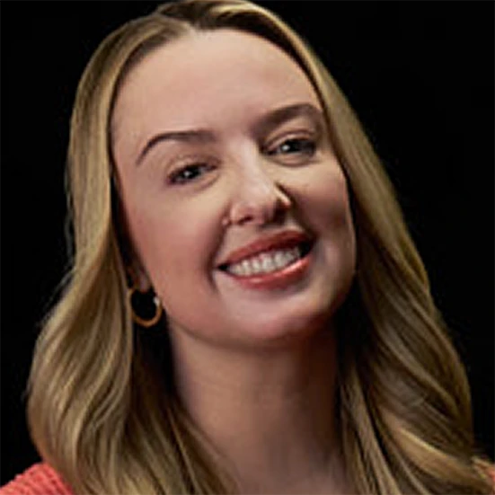 Vitiligo examples: A photo of a real patient smiling and showing off their skin after years of treatment for vitiligo with Opzelura.