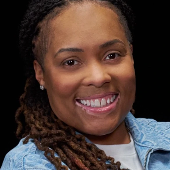 Vitiligo examples: A photo of a real patient smiling and showing off their skin after months of treatment for vitiligo with Opzelura.